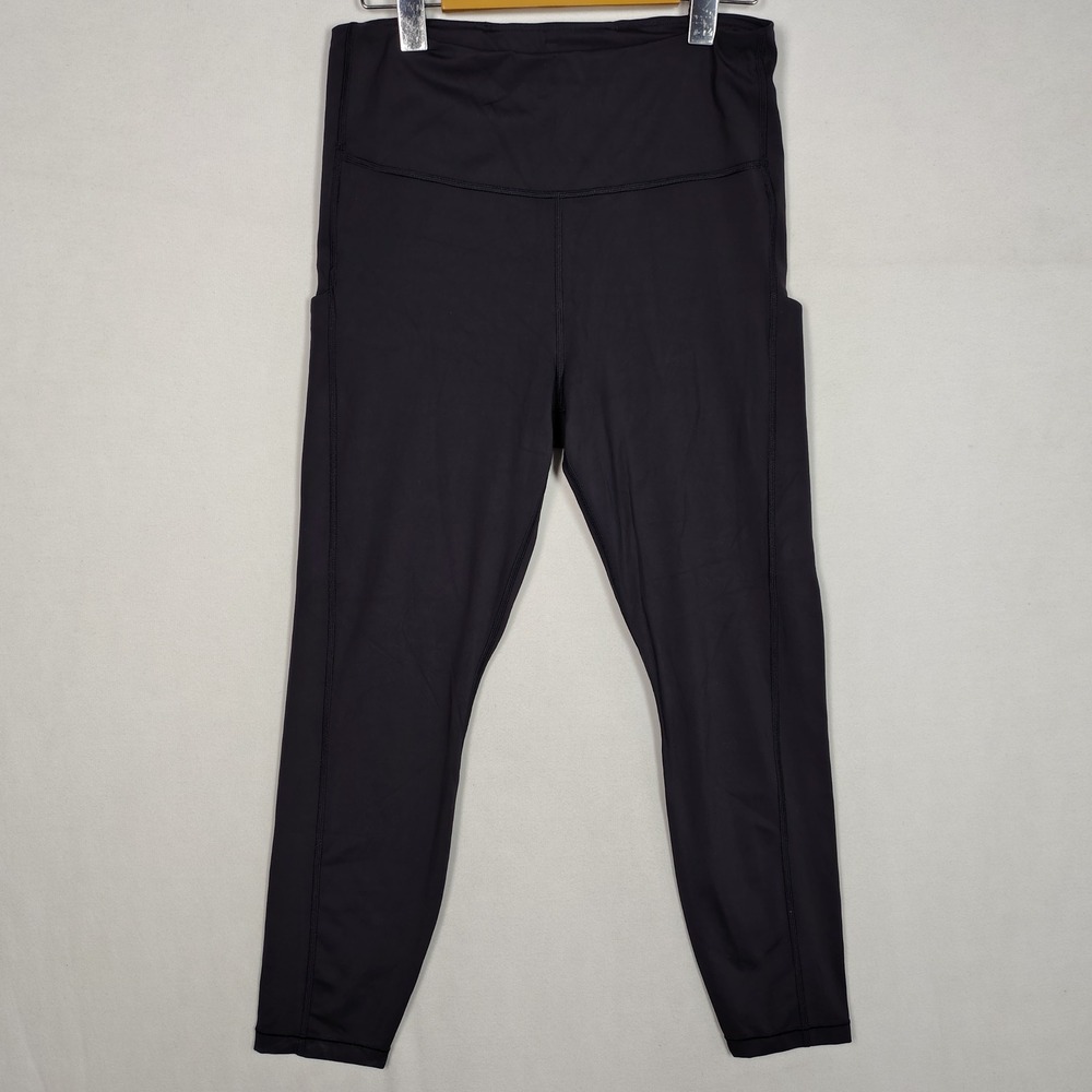 Athleta Black Salutation Stash Pocket High Rise 7/8 Leggings Size Medium